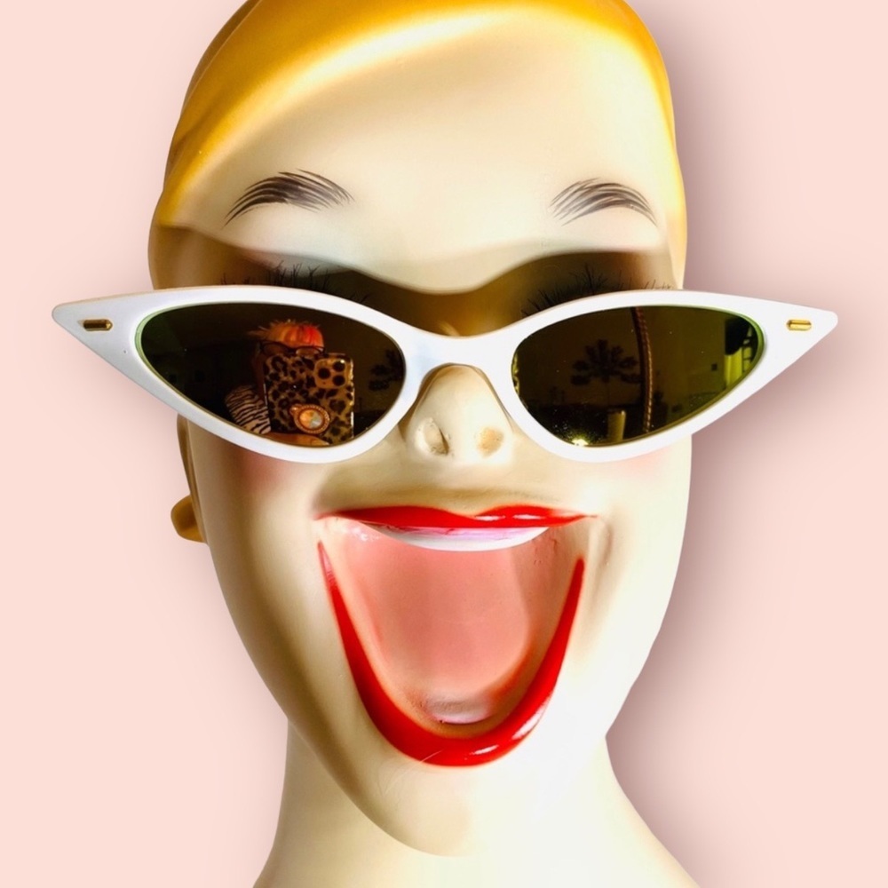 Wicked and fierce super extreme cat eye sunglasses white with mirrored lenses.